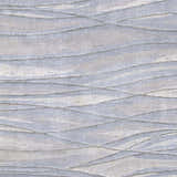 Close-up of the Sinai Light Blue rug showing its lined, wave-like pattern and wool/viscose texture. Swatch