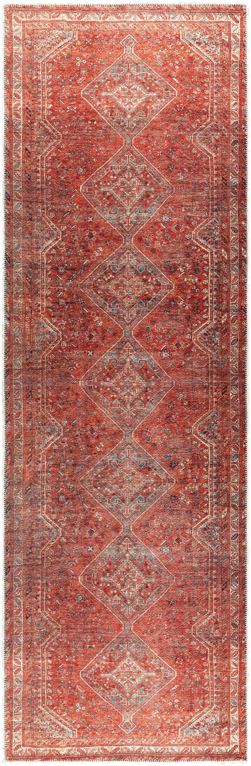 Close-up of the Siocon Washable Area Rug, a red runner with a traditional diamond pattern and fringed edges. Design-Runner-27710