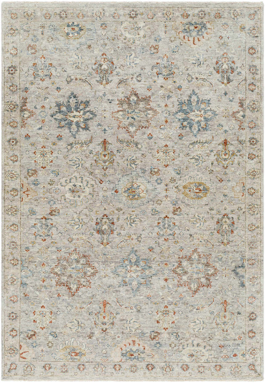 Detailed view of the beige, blue, and rust Sipocot Premium Area Rug with a traditional floral pattern. Design-Rectangle-69
