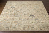 Close-up of the Sipocot Premium Area Rug, showcasing its beige, brick red, and navy bohemian pattern and hand-knotted texture. Front