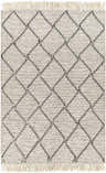 Close-up of the Siyabuswa Area Rug. Cream rug with a black geometric diamond pattern and fringe. Hand woven texture. Design-Rectangle-576