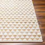 Close-up of the Colm Recycled White Jean Rug showing its beige and white geometric pattern and hand-woven texture. Front