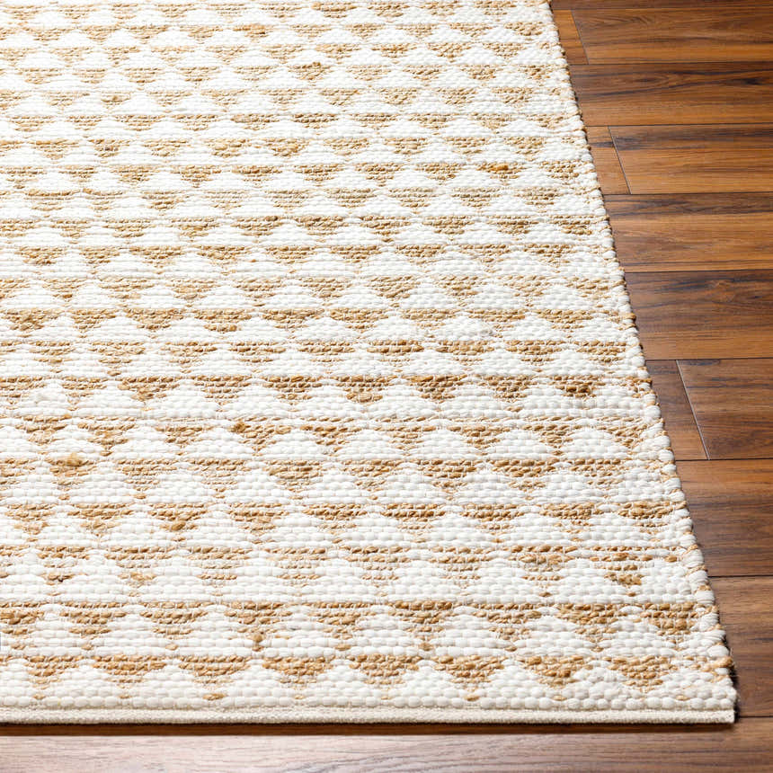 Close-up of the Colm Recycled White Jean Rug showing its beige and white geometric pattern and hand-woven texture. Front