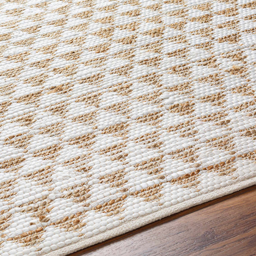Close-up of the Colm Recycled White Jean Rug showing beige jute and white recycled fabric woven in a contemporary pattern. Texture