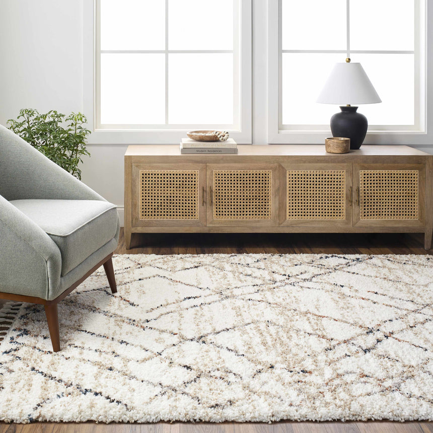 Hersz Cream Area Rug - Clearance