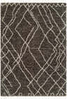 Close-up of the Hersz Gray Area Rug. Shag rug with a geometric diamond pattern and tassel fringe. Design-Rectangle-537