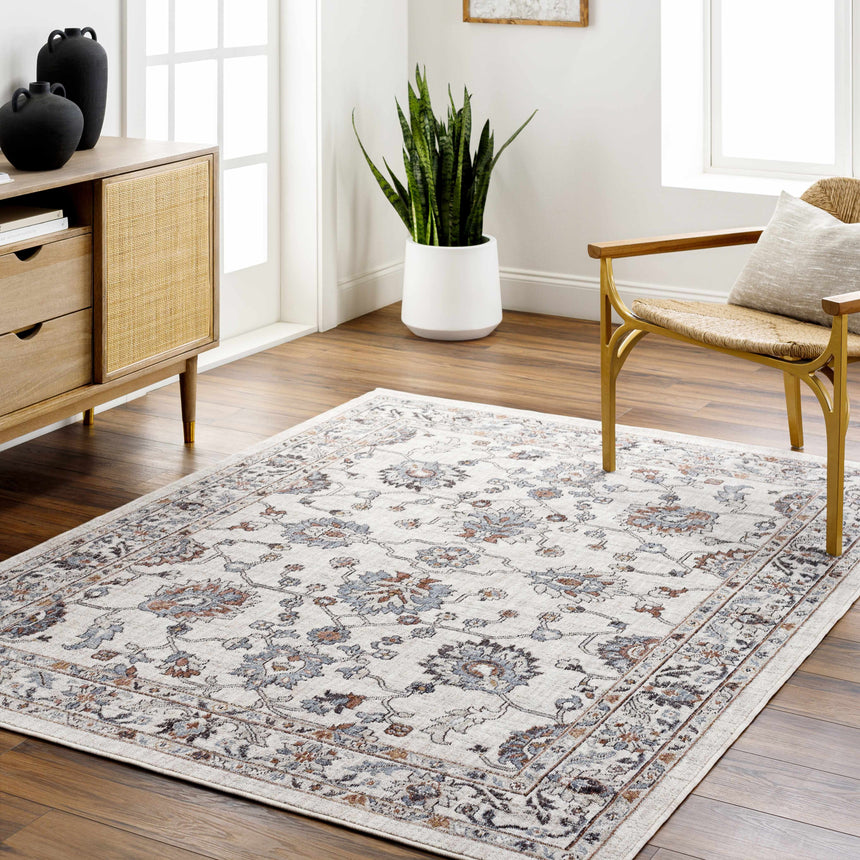Ardin Cream Area Rug - Clearance