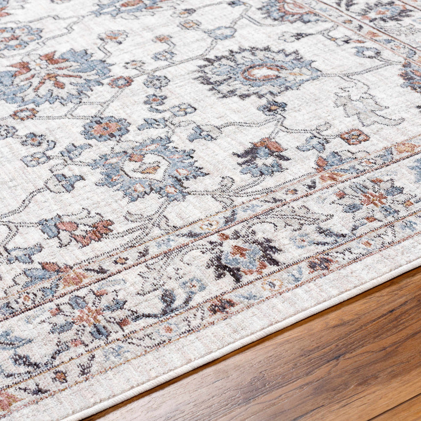 Ardin Cream Area Rug - Clearance