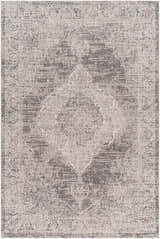 Close-up of the Azibo Area Rug. Traditional, farmhouse style in shades of gray, taupe, and brown. Machine woven, rectangle shape. Design-Rectangle-537