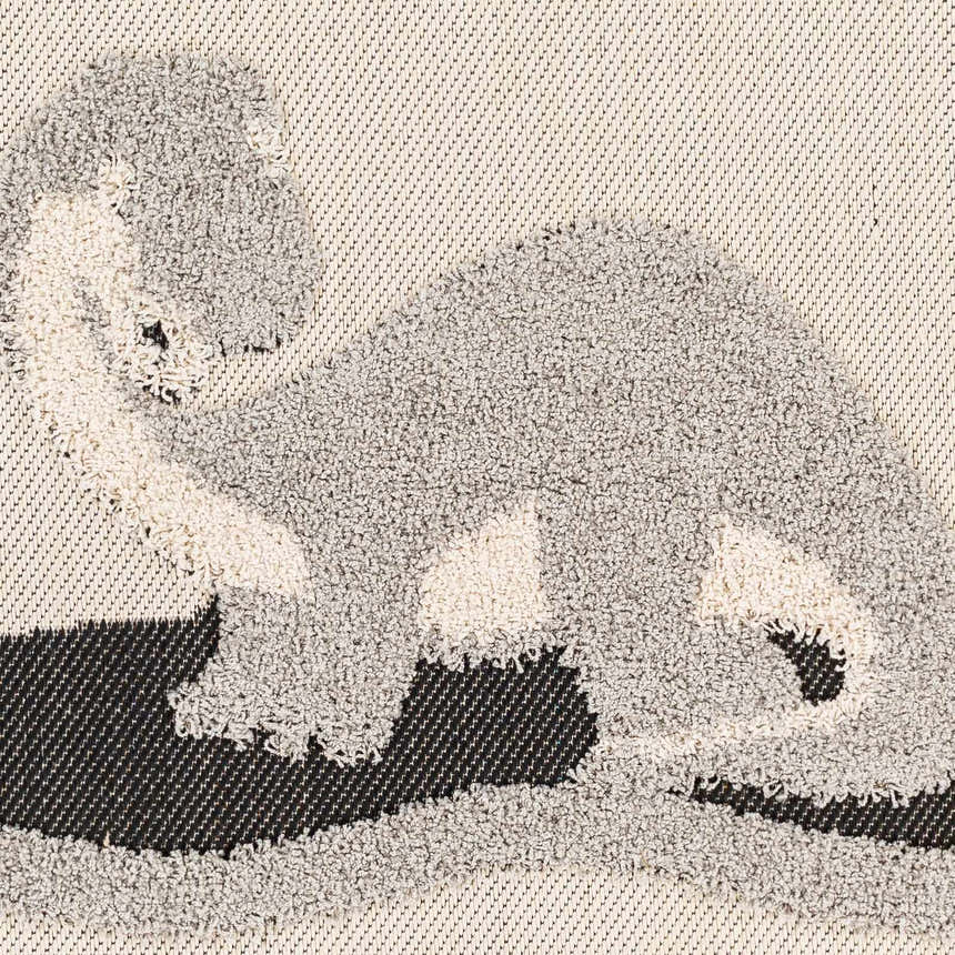 Close up of Kids Dinosaur Animal Print Nursery Area Rug with bone, dark gray, and nutmeg colors. Swatch
