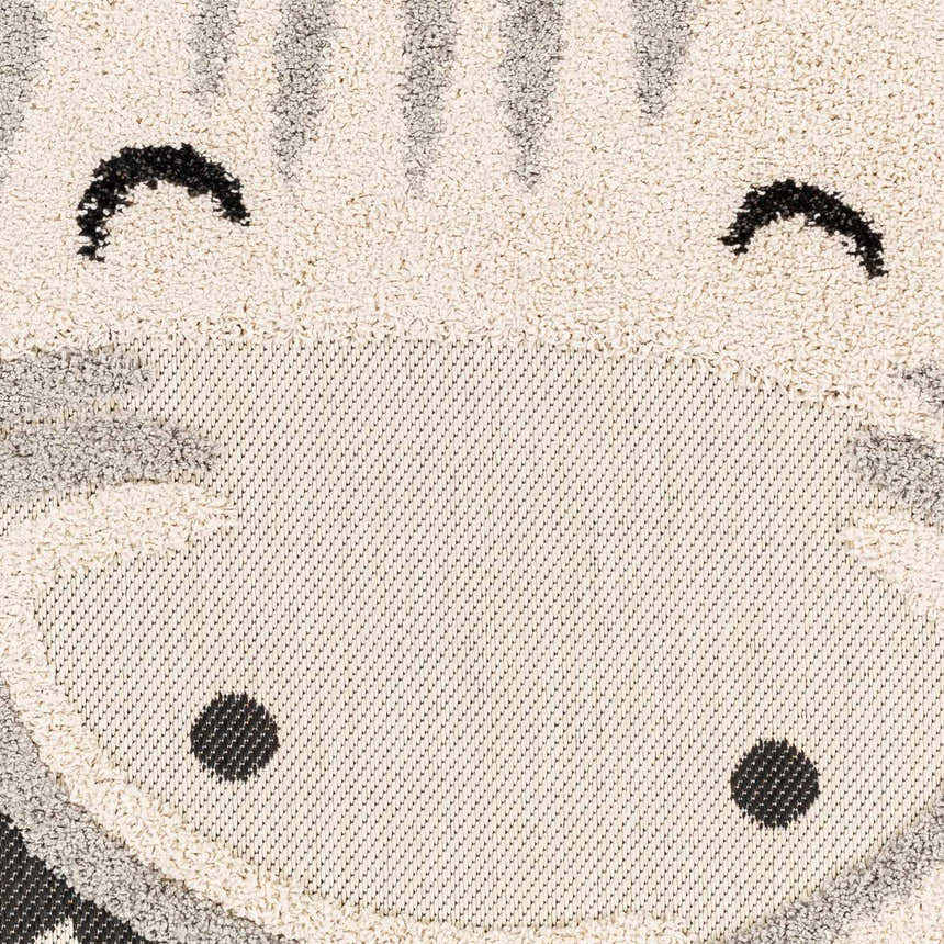 Close-up of Kids Giraffe Bowtie Animal Print Nursery Area Rug. Bone, gray, and nutmeg giraffe face design. Fun kids rug. Swatch