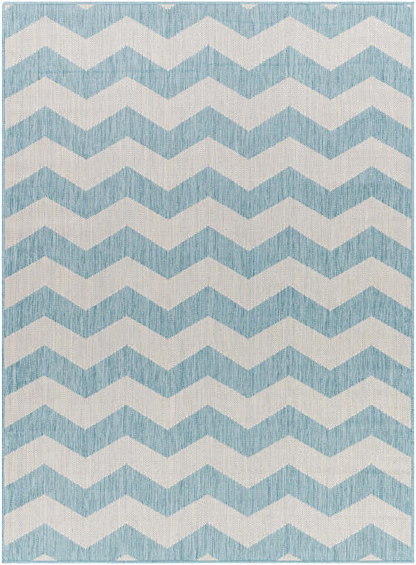 Close-up of Cheri Thatch Light Blue Area Rug featuring a modern, light blue and white chevron pattern. Design-Rectangle-537