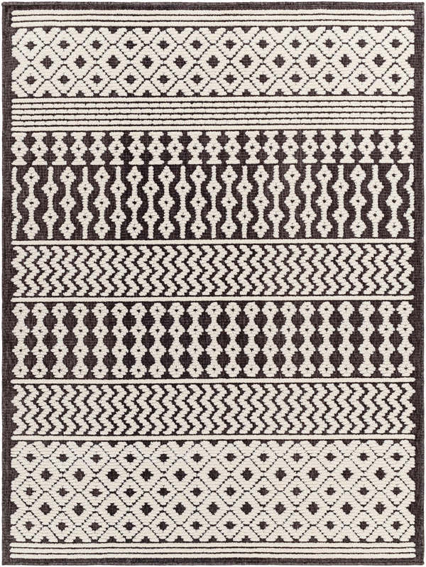 Close-up of the Drago Black Trellis Washable Rug. Features a bone and dark gray geometric Moroccan-inspired pattern. Design-Rectangle-57