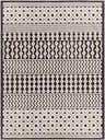 Close-up of the Drago Black Trellis Washable Rug. Features a bone and dark gray geometric Moroccan-inspired pattern. Design-Rectangle-57
