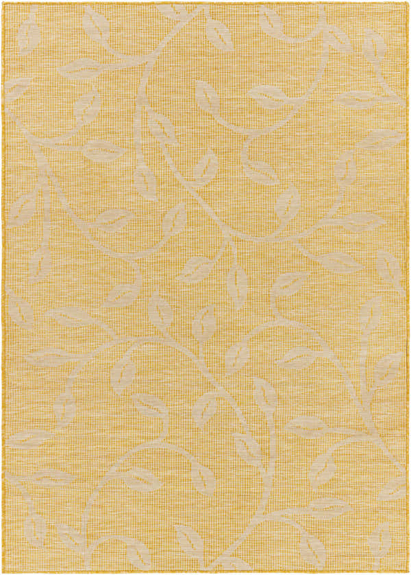 Close-up of the Smallwood Flatweave Area Carpet in saffron, featuring a delicate leaf pattern. Coastal style. Design-Rectangle-537