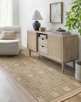 Entryway with lambswool Gerik Faux Jute Rug runner, light wood console table, chair, and plant. Farmhouse style. Roomscene-Runner