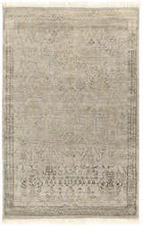 Close-up of the hand-knotted Petra 2x3 Carpet. Features a contemporary taupe, gray, and brown pattern and wool texture. Design-Rectangle-23