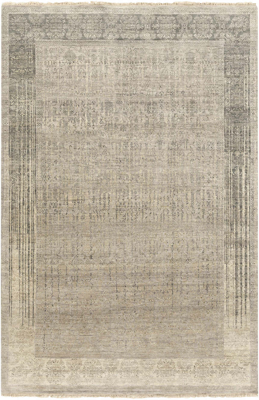 Close-up of the hand-knotted Petra 2x3 Carpet. Features dark brown, light gray, medium gray, and taupe colors. Wool texture. Design-Rectangle