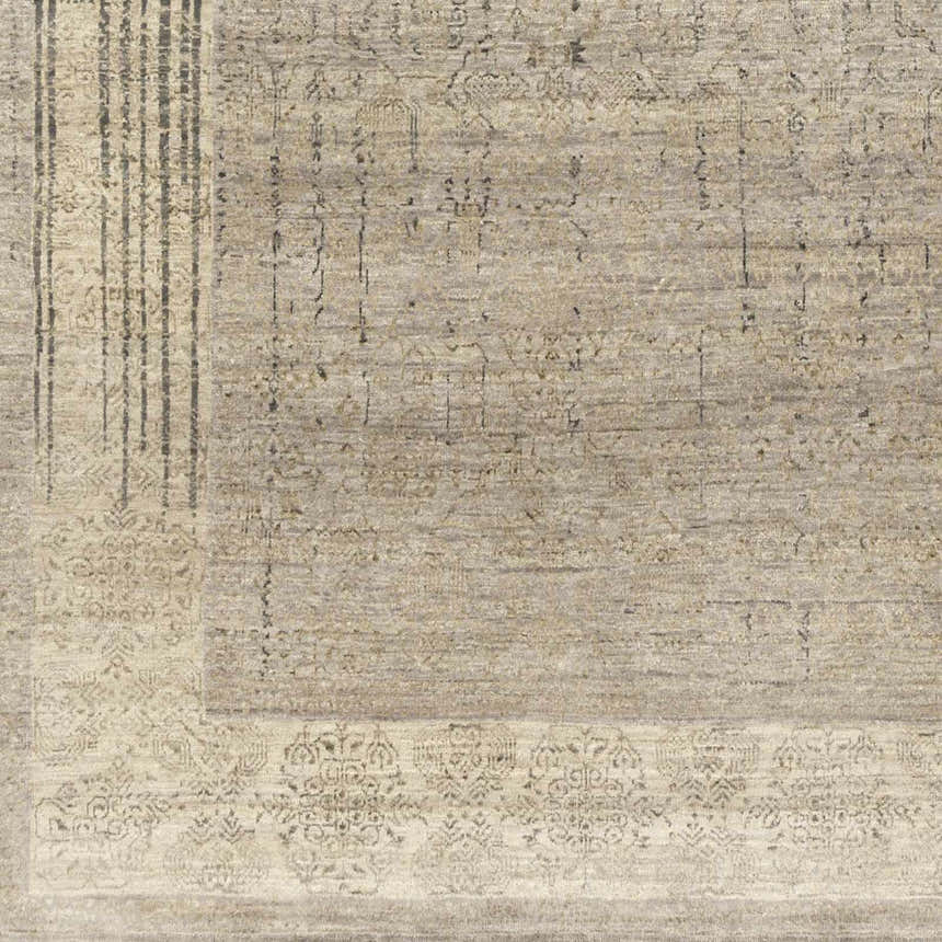 Close-up of a hand-knotted Petra 2x3 carpet. Contemporary style in dark brown, light gray, medium gray, and taupe wool. Swatch
