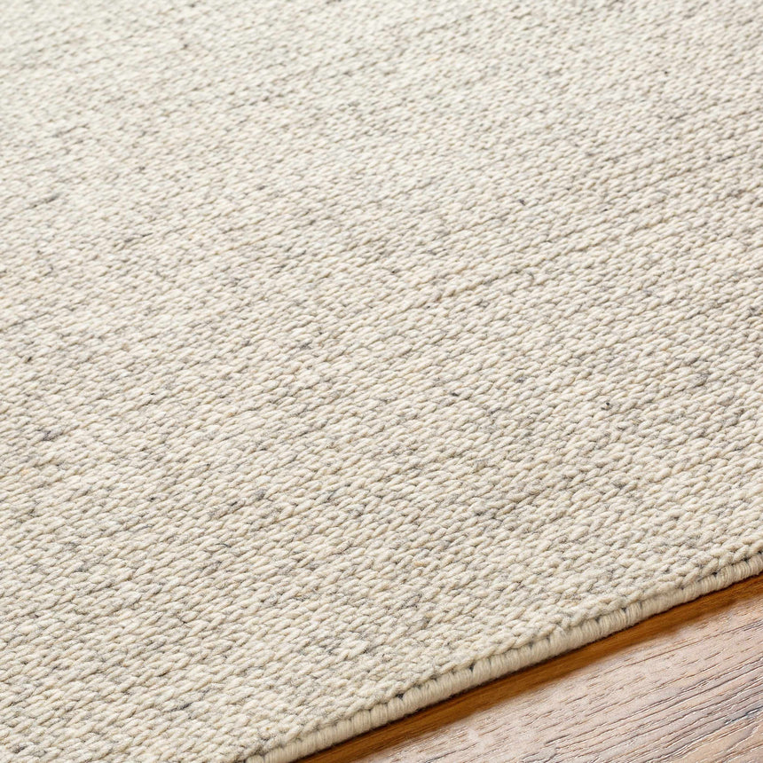 Alyra Beige Solid Area Rug - Clearance