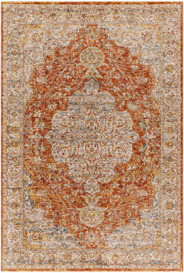Detailed view of the Aman Rust Area Rug with a traditional, ornate pattern in brick red, tan, and blue. Design-Rectangle-575