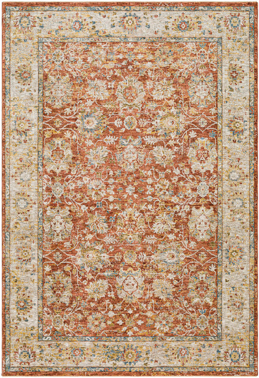 Close-up of the Duong Rust Textured Rug. Farmhouse style rug with brick red, sage, and navy floral pattern. Design-Rectangle-6796
