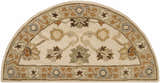 Close-up of a Hearth-shaped Smoot Area Rug. Beige wool rug with brown, olive, and slate floral pattern. Hand-tufted texture. Design-Hearth