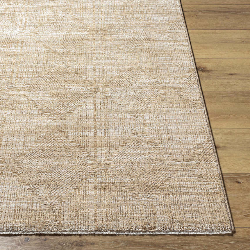 Close-up of the Dekan Tan Area Rug showing its light brown, lambswool colors and subtle geometric pattern. Front