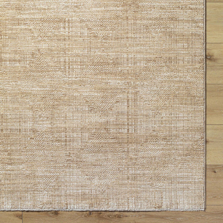 Close up of Dekan Tan Area Rug showing lambswool and light brown colors and subtle traditional pattern. Corner