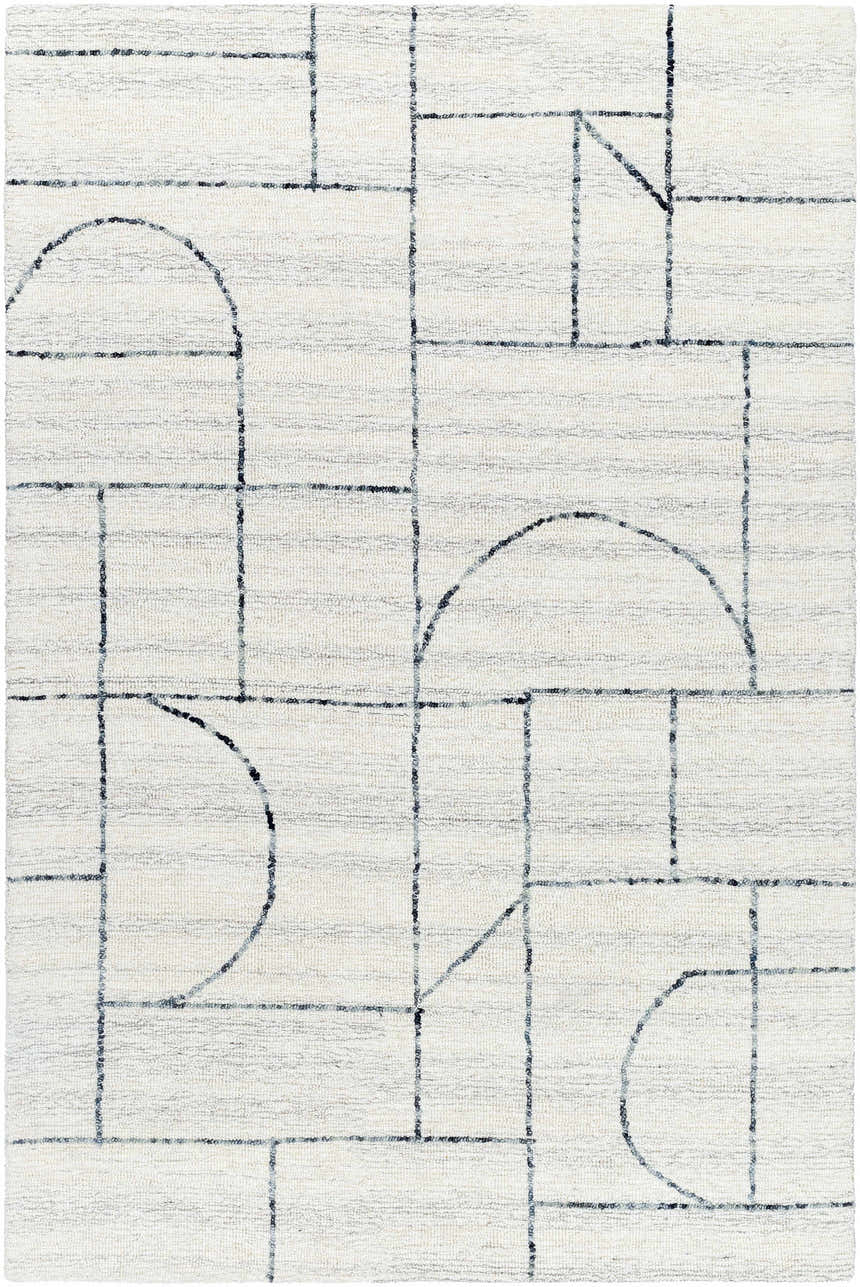 Close-up of Sanaz Charcoal Area Rug. Hand-tufted wool rug with a light silver and off white geometric pattern. Design-Rectangle-576