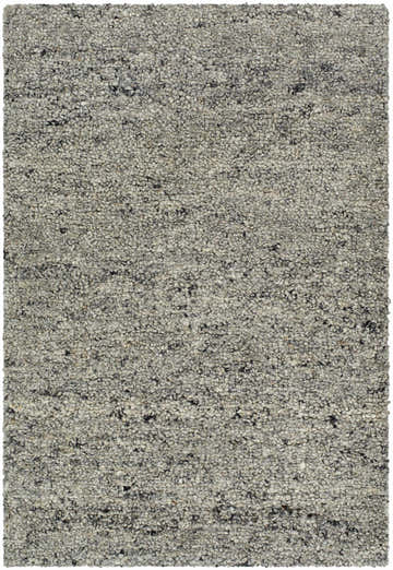 Close-up of the hand-tufted Sevan Gray Wool Area Rug. Ash, gray, sage, and silver gray tones create a textured, farmhouse feel. Design-Rectangle-23