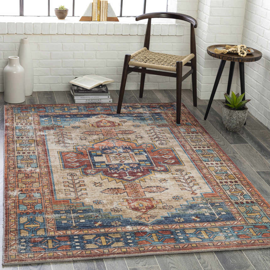 Entryway with a Southwestern style Snell Area Rug in brick red, coral, and blue tones. Roomscene-Rectangle