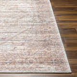 Close-up of the Elisa Area Rug showing its farmhouse style, brown tones, and subtle traditional pattern. Front