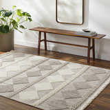 Entryway scene with a beige Igone Area Rug, wood bench, mirror, and potted plant. Farmhouse style. Roomscene-Rectangle