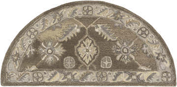 Close-up of the hearth-shaped Solen Area Rug. Hand-tufted 100% wool rug in brown, beige, and taupe with a traditional floral pattern. Design-Hearth