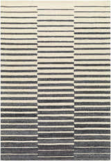 Close-up of the Gawel Charcoal Area Rug, featuring a contemporary striped pattern in beige and charcoal hues. Hand-tufted texture. Design-Rectangle-576