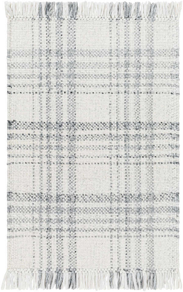 Close-up of the Inara Gray Plaid Area Rug, a hand-woven rug with a gray and white plaid pattern and fringed edges. Design-Rectangle-23