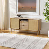 Living room scene with Inara Light Brown Plaid rug, wood floor, and light wood media cabinet with woven door panels. Roomscene-Rectangle