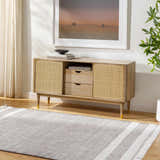 Living room scene with a Loic Light Brown Area Rug, wood console table, artwork, and neutral decor. Roomscene-Rectangle