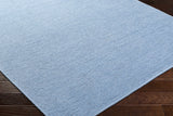 Isako Blue Solid Washable Area Rug - Clearance