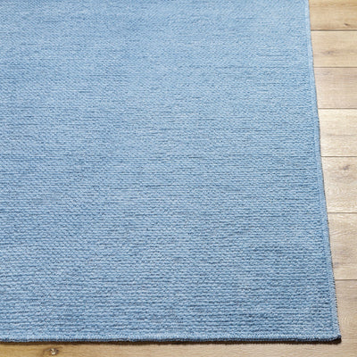 Isako Blue Solid Washable Area Rug