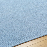 Isako Blue Solid Washable Area Rug - Clearance