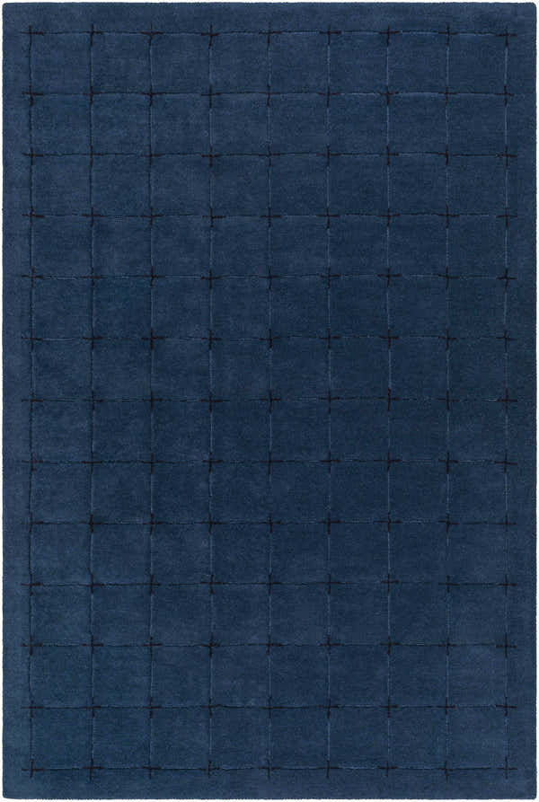 Close-up of the Sanvi Navy Wool Area Rug, featuring a contemporary grid pattern in navy and black. Hand-tufted texture. Design-Rectangle-576
