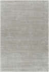 Close-up of the hand-tufted Makya Area Rug in metallic silver. Contemporary style with subtle horizontal texture. Design-Rectangle-576