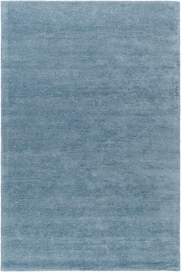 Close-up of the hand-tufted Nuray Area Rug in gray and pewter. Contemporary style with a subtle, textured design. Design-Rectangle-576