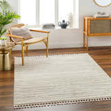 Living room scene with neutral tones and a beige striped Levy Area Rug. Roomscene-Rectangle