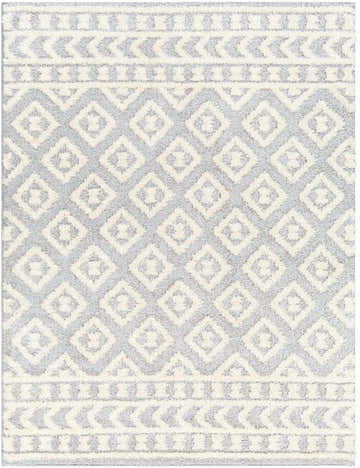 Close-up of Felix Gray Plush Area Rug featuring a gray and cream geometric diamond shag design. Design-Rectangle-537