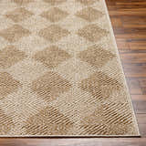 Close up of the Broox Beige Area Rug showing its diamond pattern and textured weave on dark wood floor. Front