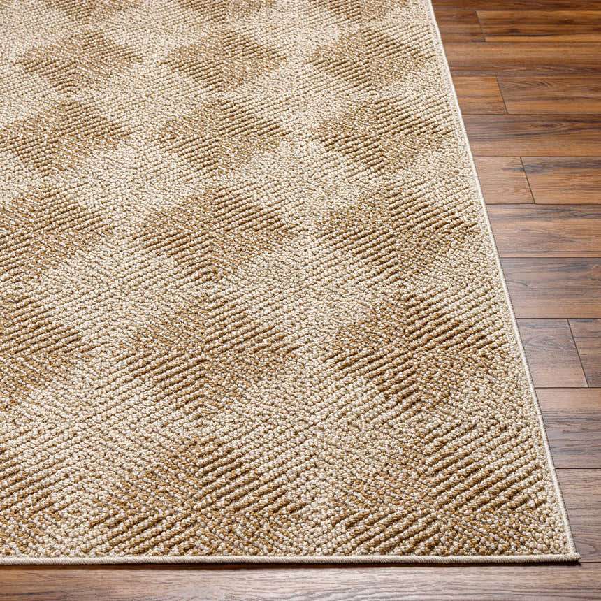 Close up of the Broox Beige Area Rug showing its diamond pattern and textured weave on dark wood floor. Front