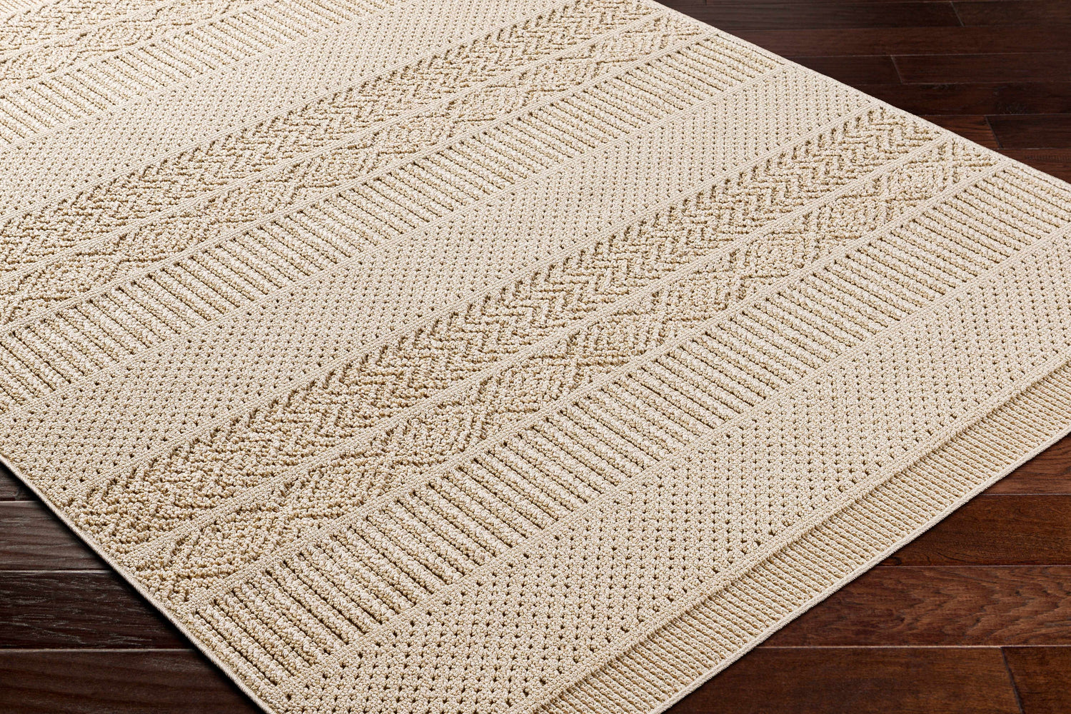 Corom Beige Area Rug - Clearance